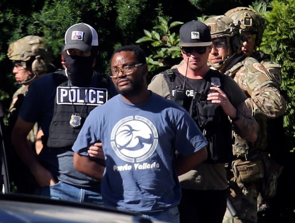 <div class="inline-image__caption"> <p>Salt Lake City police take Ayoola A. Ajayi into custody in connection with missing University of Utah student MacKenzie Lueck in Salt Lake City on Friday, June 28, 2019.</p> </div> <div class="inline-image__credit">Kristin Murphy/The Deseret News via AP</div>
