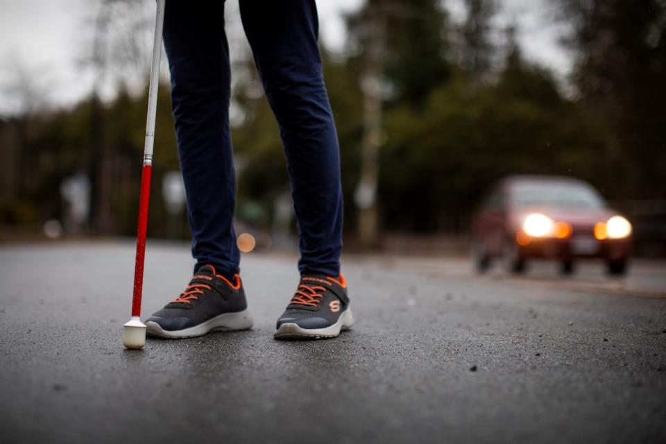 Maria Kovacs who is blind is pictured at a roundabout intersection in Maple Ridge, British Columbia on Thursday January 5, 2023. 