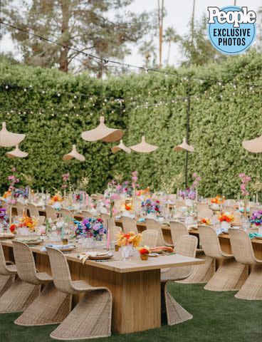 <p>Logan Cole Photography</p> A look at the colorful table displays at Zeke Smith and Nico Santos' wedding.