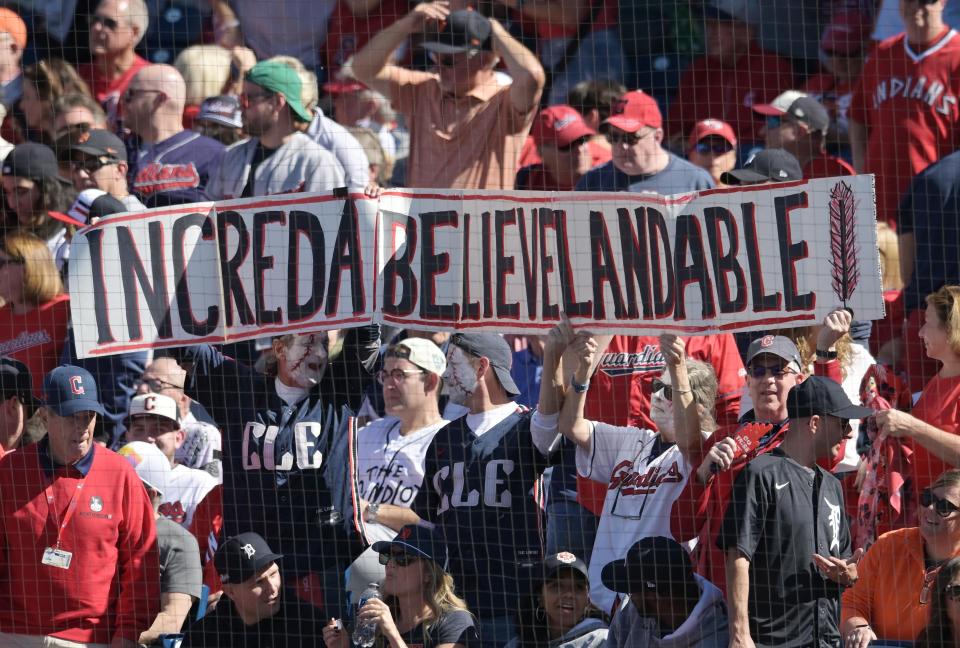 Guardians fans hold up a sign against the Detroit Tigers in Game 1 of the ALDS, Oct. 5, 2024, in Cleveland.