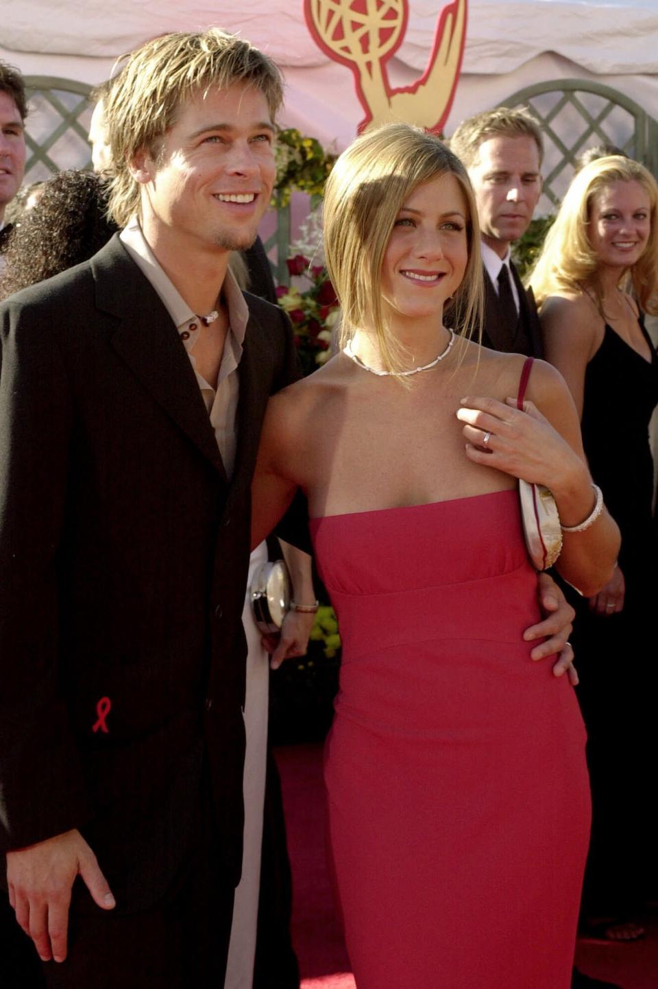 Brad Pitt and Jennifer Aniston arrives for the 52nd Annual Primetime Emmy Awards in Los Angeles, Sunday, Sept. 10, 2000. (AP Photo/Michael Caulfield)