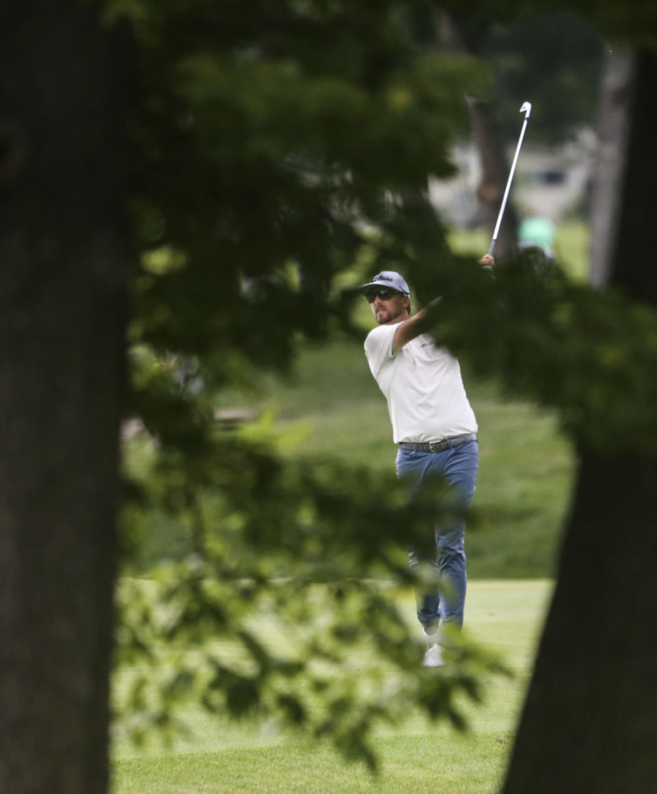 Roger Sloan hits from the fairway on the ninth hole during the second round of the John Deere Classic golf tournament Friday, July 9, 2021, in Silvis, Ill. (Jessica Gallagher/The Dispatch – The Rock Island Argus via AP)