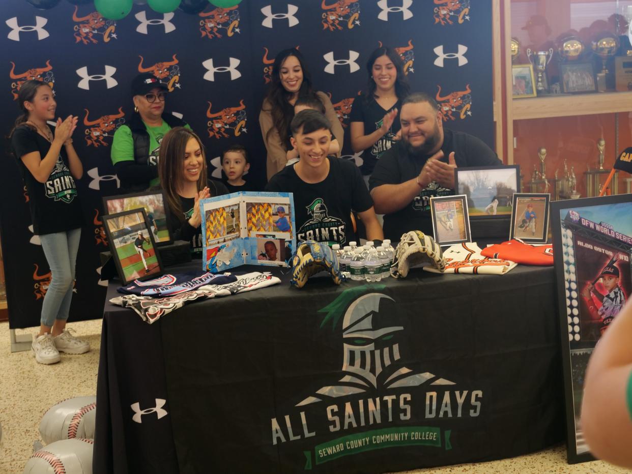 Caprock's Aldo Ostos (seated, center) signed his National Letter of Intent to play baseball for Seward County Community College on Wednesday, February 8, 2023 at Caprock High School.