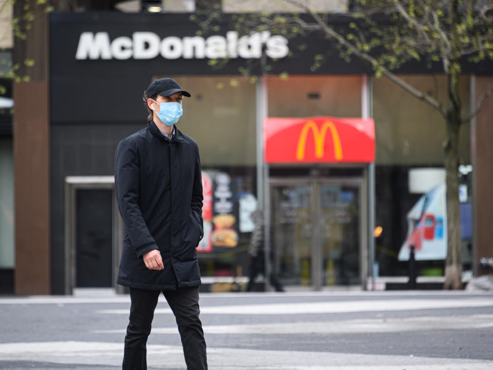 NEW YORK, NEW YORK - APRIL 30: A person wears a protective face mask outside McDonald's in Union Square during the coronavirus pandemic on April 30, 2020 in New York City. COVID-19 has spread to most countries around the world, claiming over 233,000 lives with over 3.2 million infections reported. (Photo by Noam Galai/Getty Images)