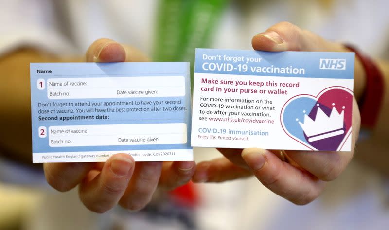 A card which will be given to patients following a vaccination for COVID-19 is seen at Croydon University Hospital in Croydon