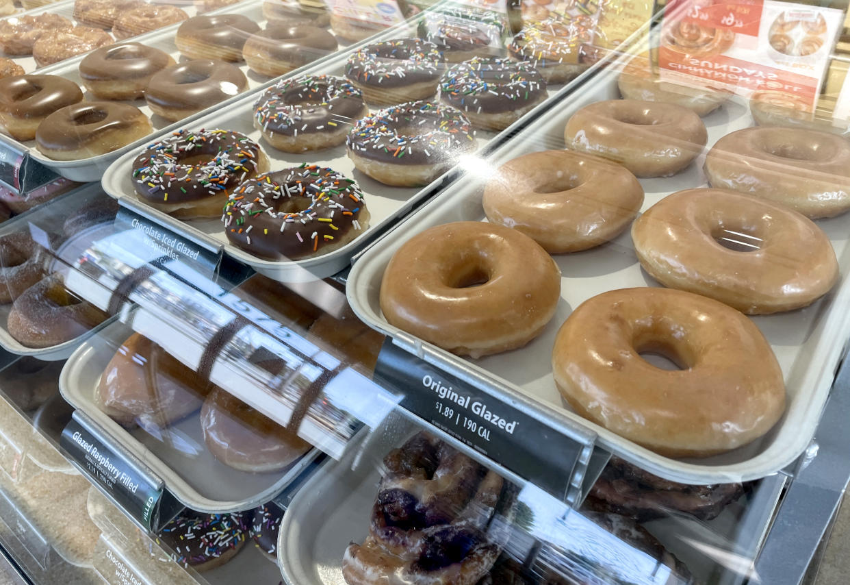 DALY CITY, CALIFORNIA - MAY 12: Krispy Kreme doughnuts are displayed at a Krispy Kreme Doughnut store on May 12, 2022 in Daly City, California. Krispy Kreme reported strong first quarter earnings with net income of $4 million compared with a loss of $3.06 million one year ago. (Photo by Justin Sullivan/Getty Images)