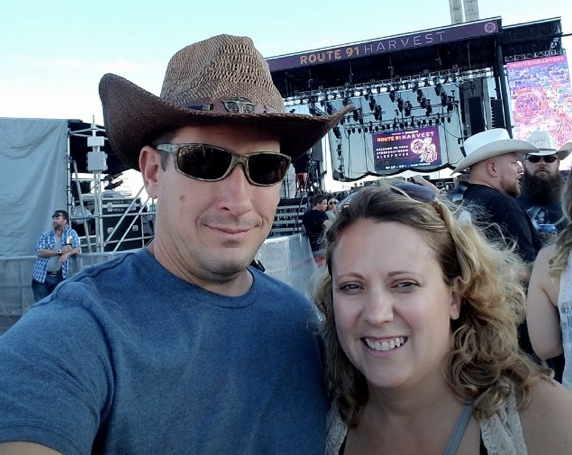 Bill Wolfe Jr. and his wife Robyn pose for a photo at last year’s Route 91 Harvest Festival not long before gunfire began. (photo via Tony Yaniello)