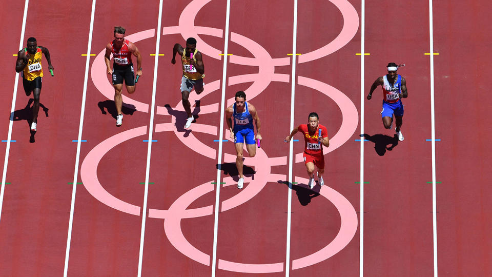 China, pictured here winning their 4x100m relay heat as USA missed the final. 