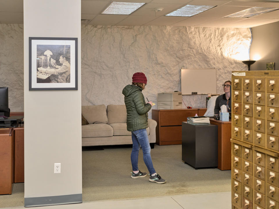 Kubiak (left) and Stauffer in the office area at the Bettmann Archive.