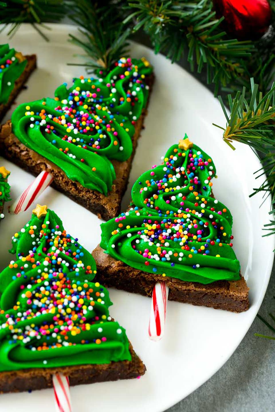 <p>Let your children's imaginations run wild decorating these chocolatey trees.</p><p><strong>Get the recipe at <a href="https://www.dinneratthezoo.com/christmas-tree-brownies/" rel="nofollow noopener" target="_blank" data-ylk="slk:Dinner at the Zoo;elm:context_link;itc:0;sec:content-canvas" class="link ">Dinner at the Zoo</a>.</strong> </p>