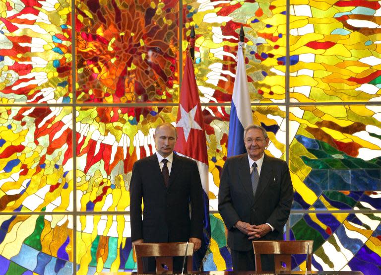 Russian President Vladimir Putin (left) held talks with his Cuban counterpart Raul Castro during a 2014 visit to Havana