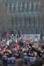 Protesters march during a demonstration against plans to push back France's retirement age, Tuesday, Jan. 31, 2023 in Paris. Labor unions aimed to mobilize more than 1 million demonstrators in what one veteran left-wing leader described as a "citizens' insurrection." The nationwide strikes and protests were a crucial test both for President Emmanuel Macron's government and its opponents. (AP Photo/Thibault Camus)