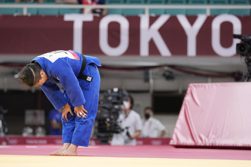 Funa Tonaki of Japan reacts after competing against Distria Krasniqi of Kosovo during their women's -48kg championship judo match at the 2020 Summer Olympics, Saturday, July 24, 2021, in Tokyo, Japan. (AP Photo/Vincent Thian)