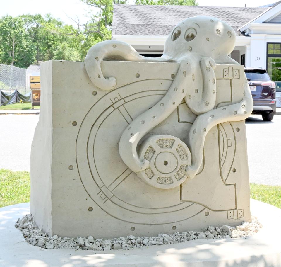 This sand sculpture in front of The Cooperative Bank of Cape Cod in Yarmouth Port is one of what will eventually be 33 that professional sculptors Sean and Tracey Fitzpatrick will build using more than 100 tons of sand.