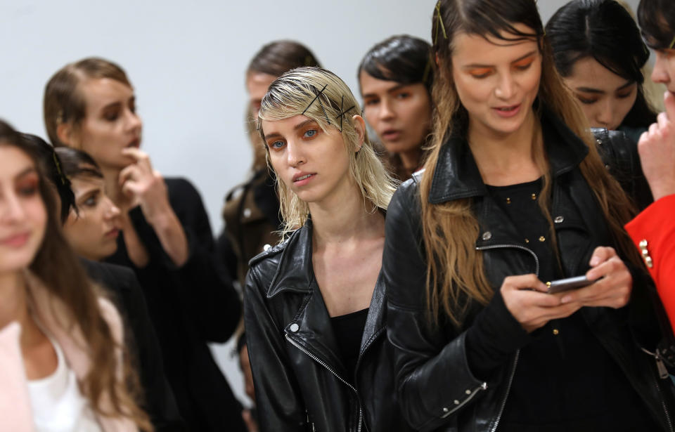 <p>Orange eyeshadow remains a strong beauty look for SS18. <em>[Photo: PA]</em> </p>