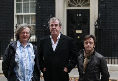 BBC automobile program Top Gear presenters James May (L), Jeremy Clarkson (C) and Richard Hammond pose outside 10 Downing Street in London November 29, 2011. REUTERS/Suzanne Plunkett