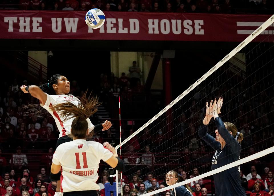 Wisconsin middle blocker Carter Booth prepares to send a shot across the net during the Badgers' win over Penn State in the Sweet 16 on Dec. 7. Booth, who's 6-foot-7, will go up against Texas' Asjia O'Neal and Molly Phillips in Thursday's national semifinal match.