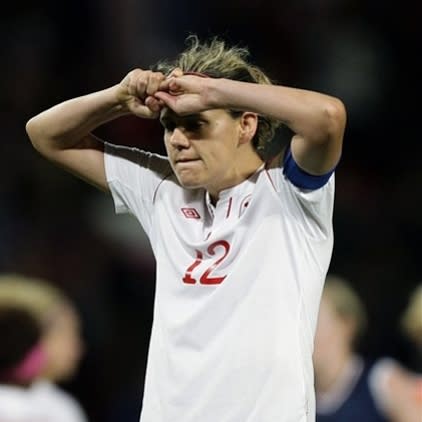 Canada's Christine Sinclair reacts after her team's 4-3 loss to the United Stated in their semifinal women's soccer match at the 2012 London Summer Olympics, Monday, Aug. 6, 2012 at Old Trafford Stadium in Manchester, England. (AP Photo/Jon Super)