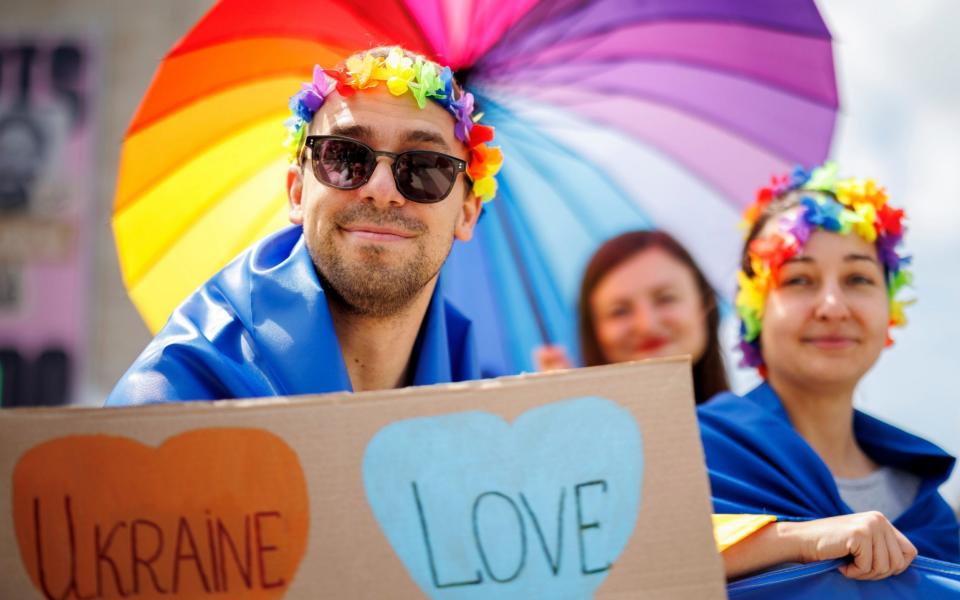 Revellers from Ukraine take part in the Belgian Pride Parade in Brussels - Olivier Matthys/AP