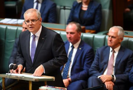 Australia's Treasurer Scott Morrison delivers the federal budget in the House of Representatives at Parliament House in Canberra, Australia, May 9, 2017. AAP/Lukas Coch/via REUTERS