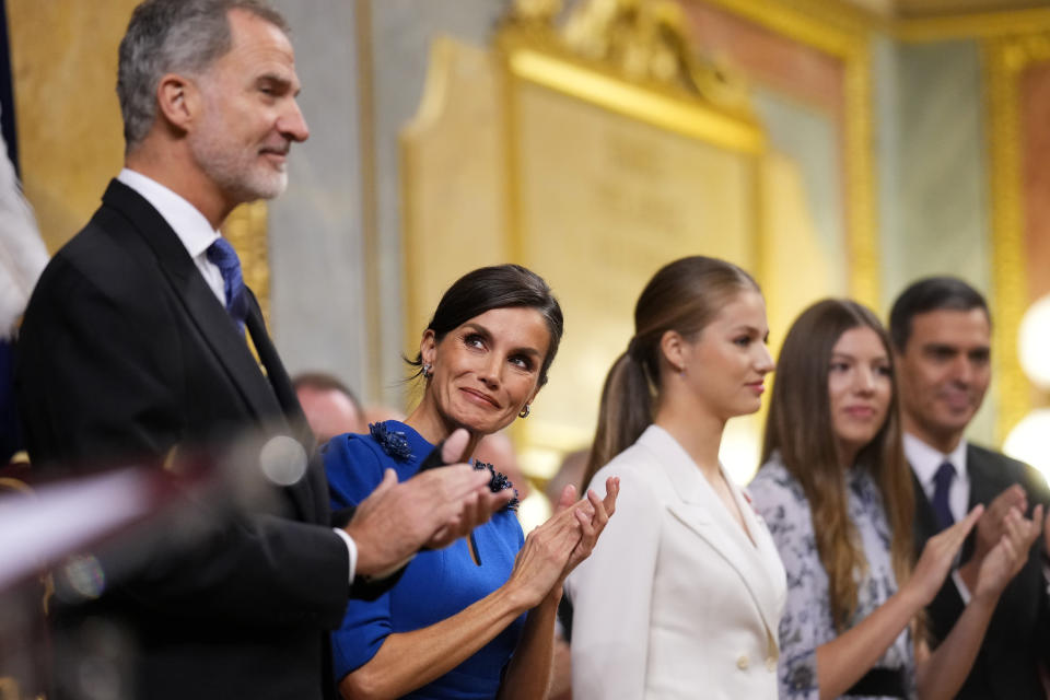 Princess Leonor, center, receives the applause of Spanish King Felipe VI, Queen Letizia and her sister Sofia, right, after swearing allegiance to the Constitution during a gala event that makes her eligible to be queen one day, in Madrid on Tuesday, Oct. 31 2023. The heir to the Spanish throne, Princess Leonor, is to swear allegiance to the Constitution on her 18th birthday Tuesday, in a gala event that paves the way to her becoming queen when the time comes. Leonor is the eldest daughter of King Felipe and Queen Letizia. (AP Photo/Manu Fernandez)