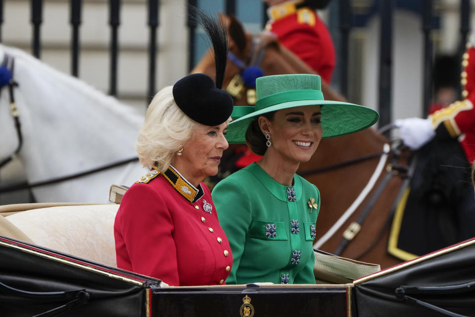 Camilla, the Queen Consort, left, and Kate, Princess of Wales, leave Buckingham Palace to take part in the Trooping The Colour parade, in London, Saturday, June 17, 2023. Trooping the Colour is the King's Birthday Parade and one of the nation's most impressive and iconic annual events attended by almost every member of the Royal Family.(AP Photo/Alastair Grant)