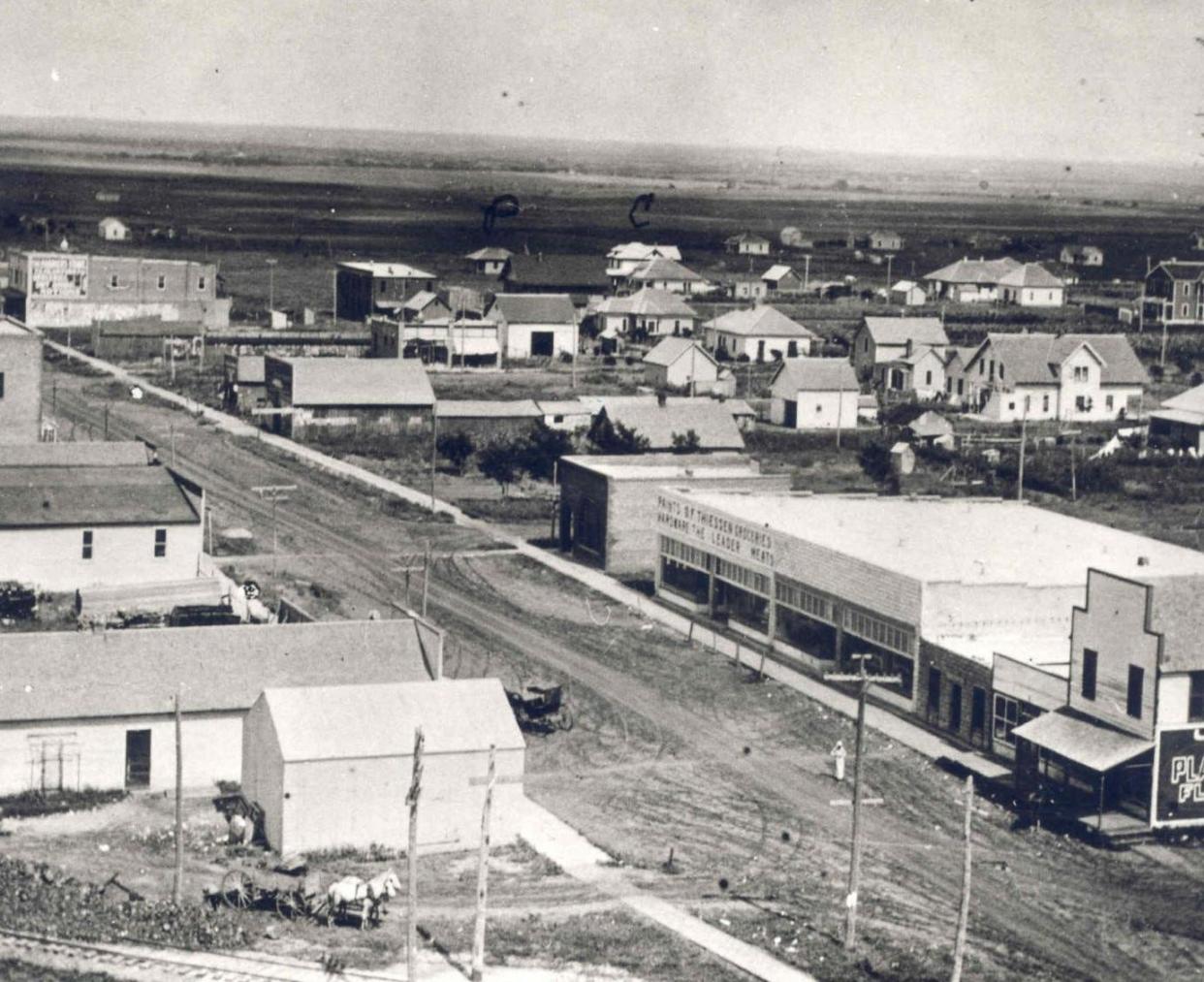 This early day aerial view of Britton shows a dirt road through the northwest metro-area community.