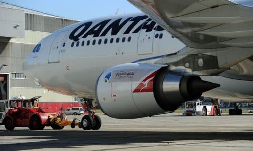 A Qantas A330 moves to a departure gate to pick up invited passengers at Sydney Airport ahead of Australia's first flight powered by sustainable aviation fuel on April 13, 2012