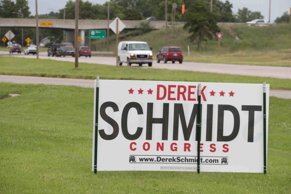 Campaign signs, like this one off N.W. Topeka Boulevard for Derek Schmidt, are limited in the areas they are allowed to be placed around highways, within Shawnee County and Topeka city limits.