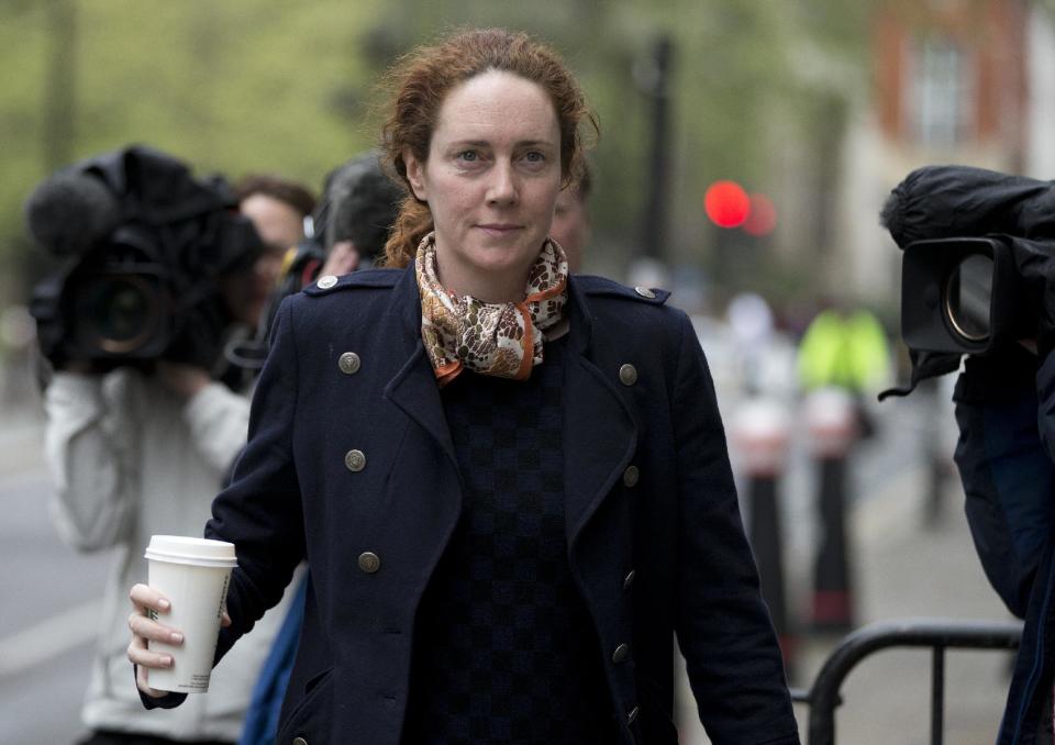 Rebekah Brooks, former News International chief executive, arrives at the Central Criminal Court, the Old Bailey, in London where she appears to face charges related to phone hacking Tuesday, April, 22, 2014. (AP Photo/Alastair Grant)