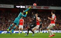 Football - Arsenal v Liverpool - Barclays Premier League - Emirates Stadium - 24/8/15 Arsenal's Petr Cech in action with Liverpool's Christian Benteke Action Images via Reuters / Tony O'Brien Livepic