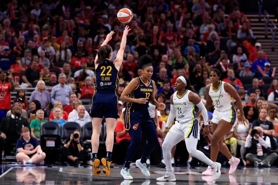 INDIANAPOLIS, INDIANA - SEPTEMBER 15: Caitlin Clark #22 of the Indiana Fever takes a shot during the first half against the Dallas Wings at Gainbridge Fieldhouse on September 15, 2024 in Indianapolis, Indiana. (Photo by Justin Casterline/Getty Images)