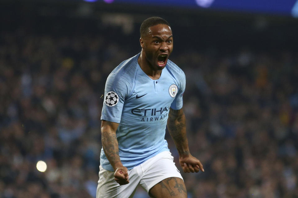 Manchester City's Raheem Sterling celebrates before his goal was disallowed for offside against Manchester City's Sergio Aguero following a VAR review during the Champions League quarterfinal, second leg, soccer match between Manchester City and Tottenham Hotspur at the Etihad Stadium in Manchester, England, Wednesday, April 17, 2019. (AP Photo/Dave Thompson)