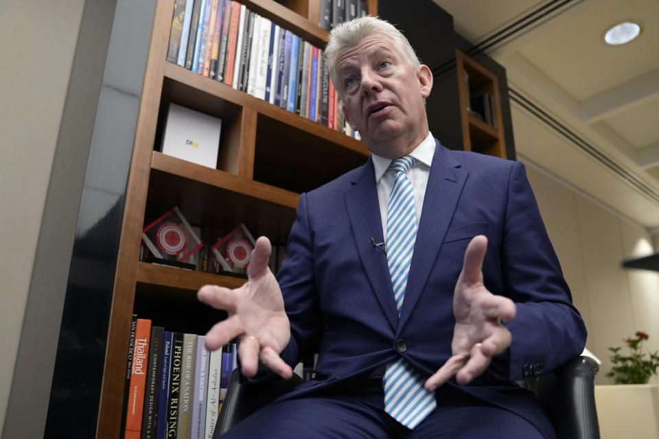 Paul Griffiths, the CEO of Dubai Airports, speaks during an interview with The Associated Press in Dubai, United Arab Emirates, Tuesday, Nov. 22, 2022. Dubai International Airport passenger numbers surpassed pre-COVID-19 pandemic levels in the third quarter of 2022, Griffiths said, causing the airport to revise its annual forecast by another 1 million passengers. (AP Photo/Kamran Jebreili)