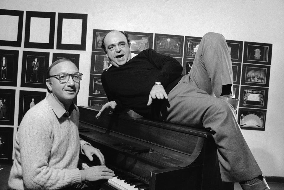 Playwright Neil Simon, left, and actor James Coco ham it up at piano, Monday, Nov. 23, 1981 in New York during the New York announcement of a Broadway bound musical comedy, ?Little Me.? Coco will star in the new show, written by Simon, along with Victor Garber and Mary Gordon Murray, slated for a Jan. 21st opening at the Eugene O?Neill Theater. (AP Photo/Lederhandler)