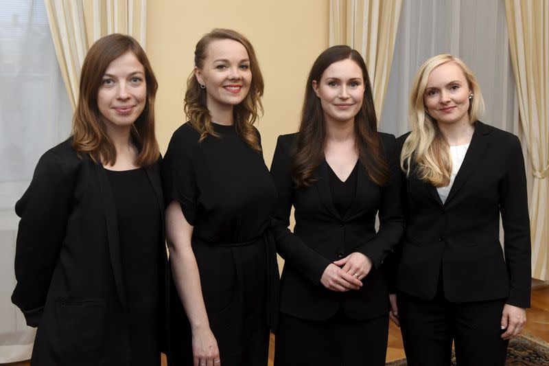 Finland's Prime Minister Sanna Marin, Minister of Education Li Andersson, Minister of Finance Katri Kulmuni and Minister of Interior Maria Ohisalo pose after the first government meeting in Helsinki