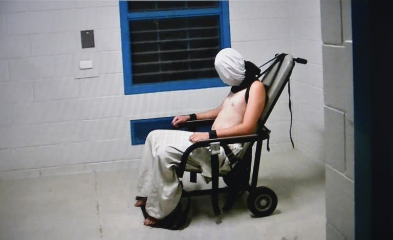 Frame grab from Australian Broadcasting Corporation footage aired in July 2016 shows a teenage boy hooded and strapped into a chair at a youth detention centre in the Northern Territory city of Darwin