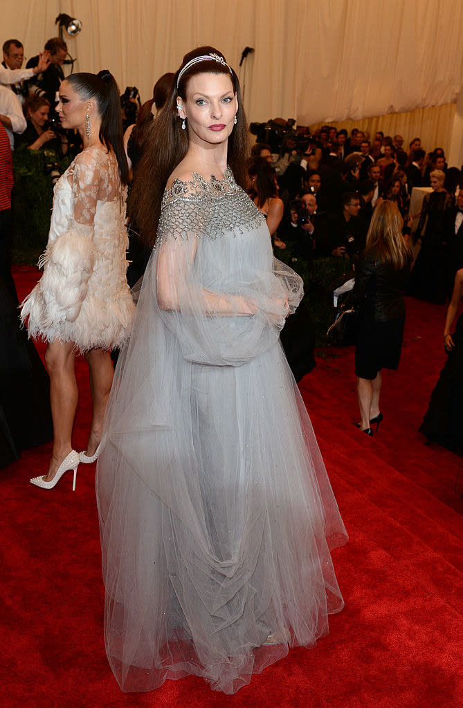 Linda wearing a floofy blue dress