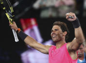 Spain's Rafael Nadal celebrates after defeating Federico Delbonis of Argentina in second round singles match at the Australian Open tennis championship in Melbourne, Australia, Thursday, Jan. 23, 2020. (AP Photo/Dita Alangkara)