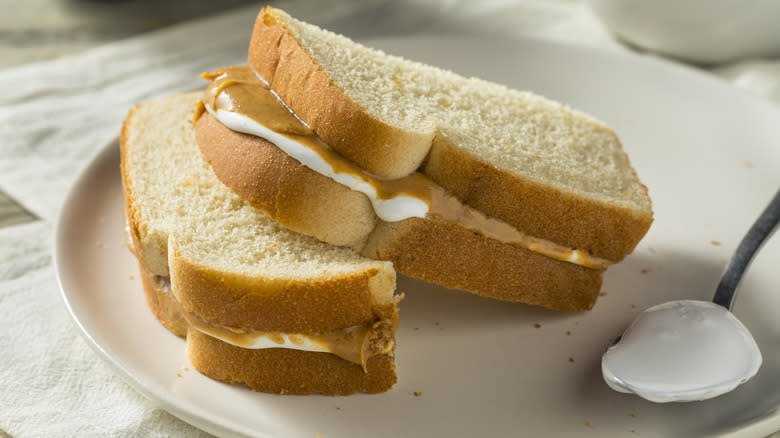 Fluffernutter sandwich plated next to spoon
