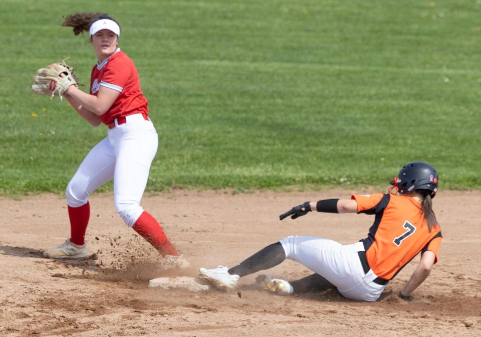 Alliance's Cameryn Mullaly puts out Massillon's Reese Bactel during their game at Massillon Saturday, May 6, 2023. 