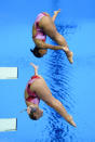 Canada's Emilie Heymans and Jennifer Abel dive in the women's synchronised 3-metre springboard final at the Aquatic Centre in the Olympic Village at the 2012 Summer Olympics in London on Sunday, July 29, 2012. THE CANADIAN PRESS/Sean Kilpatrick