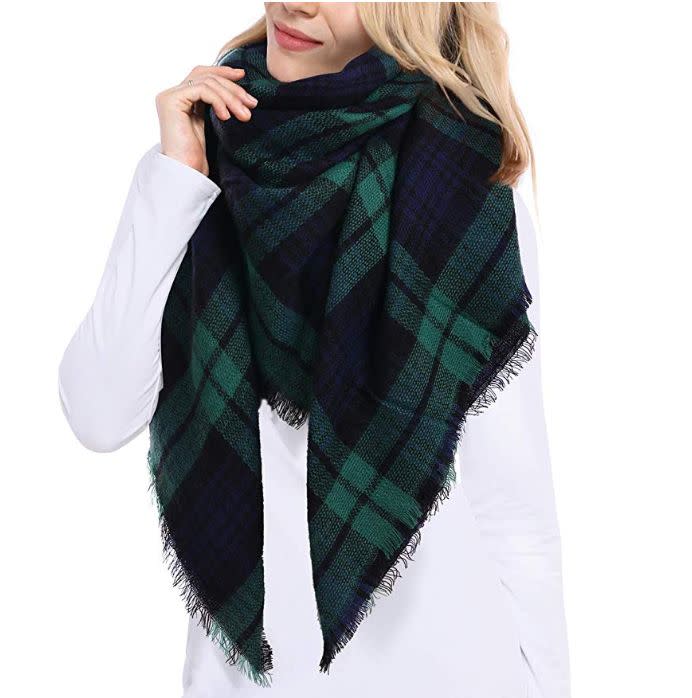 This oversized scarf can be worn different ways to keep you warm. Find it for $9 on <strong><a href="https://amzn.to/31DRydD" target="_blank" rel="noopener noreferrer">Amazon</a></strong>.