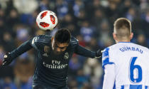 Real Madrid's Casemiro, left, heads for the ball with Leganes' Gumbau during a Spanish Copa del Rey soccer match between Leganes and Real Madrid at the Butarque stadium in Leganes, Spain, Wednesday, Jan. 16, 2019. (AP Photo/Valentina Angela)