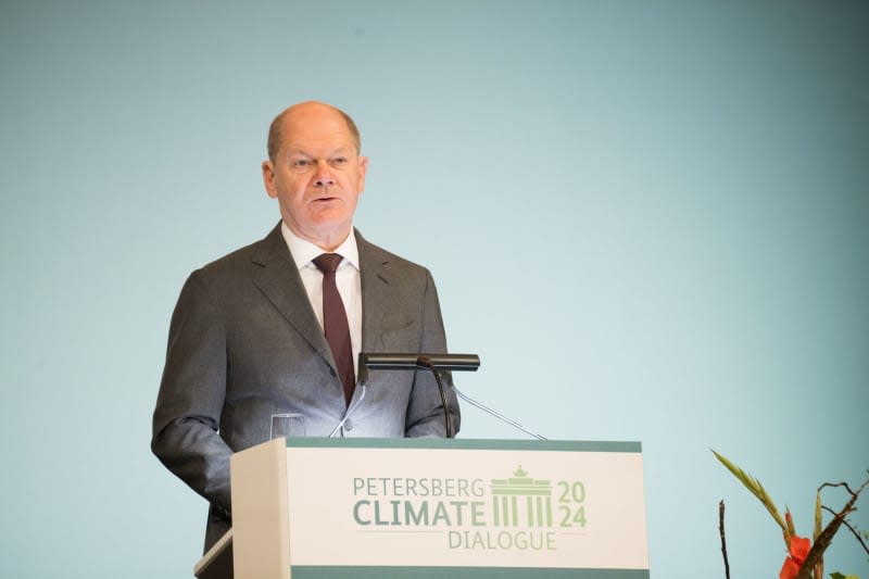 Germany's Chancellor Olaf Scholz speaks during the Petersberg Climate Dialogue. Sebastian Christoph Gollnow/dpa