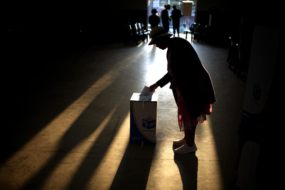 FILE - A woman casts her ballot at a polling station, during general elections in Eshowe, South Africa, on May 29, 2024. South Africa is in a moment of deep soul-searching after an election that brought a jarring split from the African National Congress, the very party that gave the country freedom and democracy 30 years ago. (AP Photo/Emilio Morenatti, File)