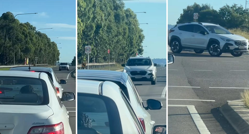 A car driving on the wrong side of the road. 