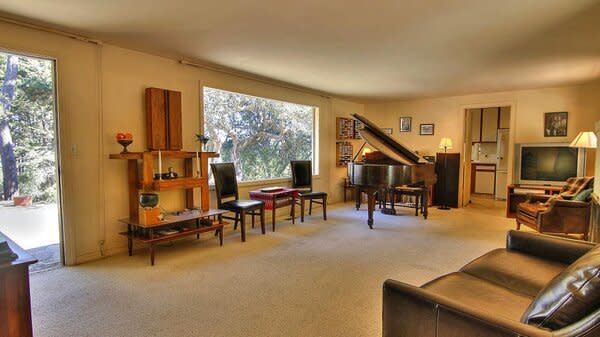 The redesign slightly reduced the living room's size to make more room for the kitchen and a relocated dining room.