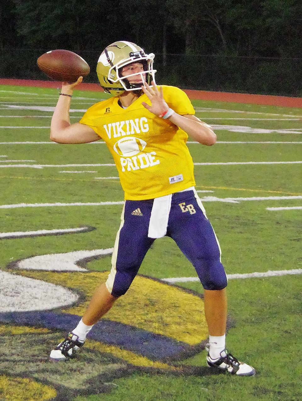 Sophomore Ethan Pohl, QB for the East Bridgewater Vikings, gets some extra throwing in while waiting for the scrimmage drills at practice on Tuesday, Sept. 5, 2023.