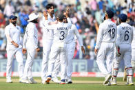 India's bowler Ishant Sharma (3rd L) celebrates after taking the wicket of Bangladesh's batsman Imrul Kayes during the first day of the second Test cricket match of a two-match series between India and Bangladesh at The Eden Gardens cricket stadium in Kolkata on November 22, 2019. (Photo by Dibyangshu SARKAR / AFP) / IMAGE RESTRICTED TO EDITORIAL USE - STRICTLY NO COMMERCIAL USE
